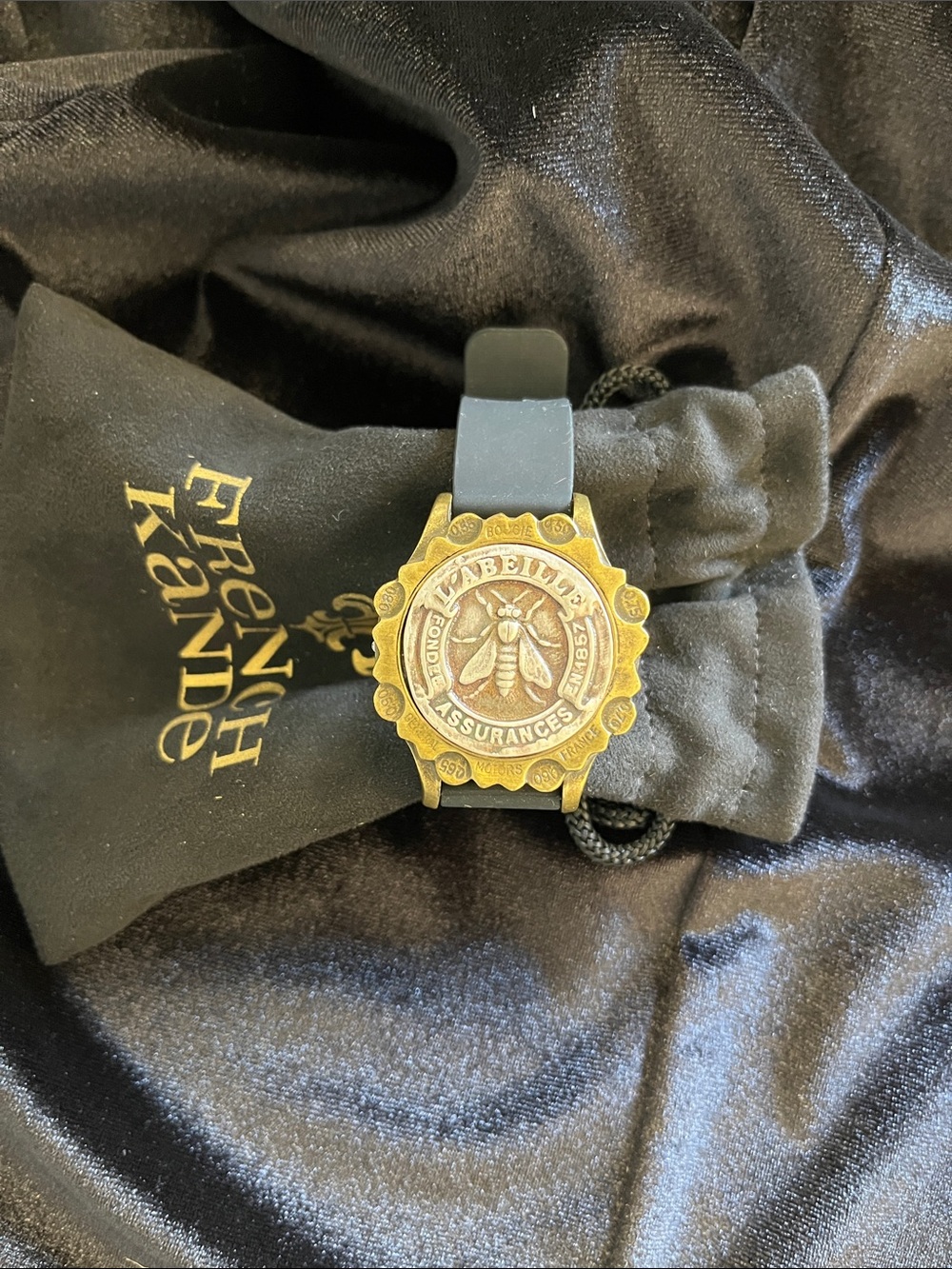 Ss531 French Kande Gold Bee Medallion Bracelet on Black leather band